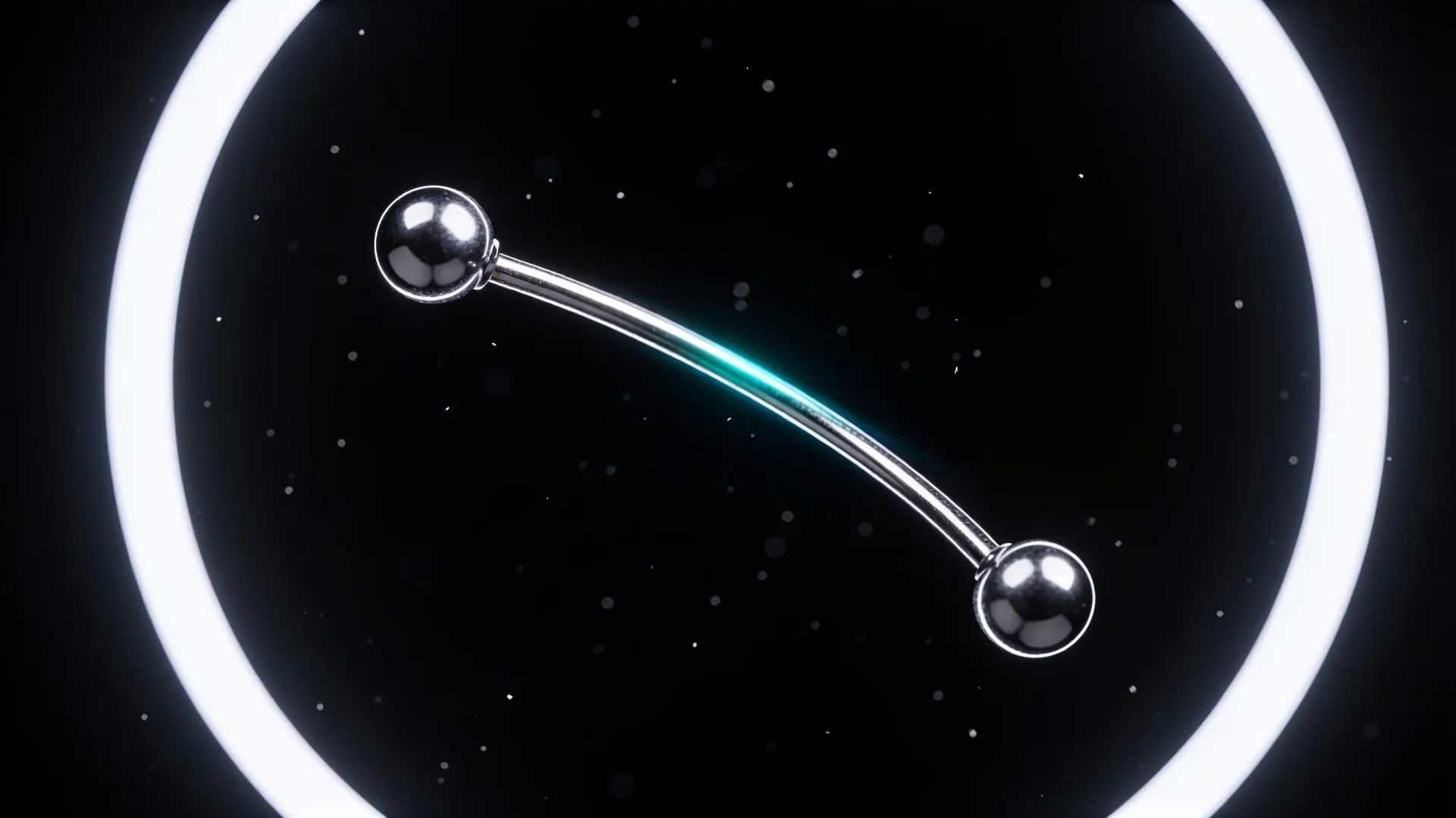 Titan-Piercingschmuck schwebt vor schwarzem Hintergrund im Licht eines Ringlichts